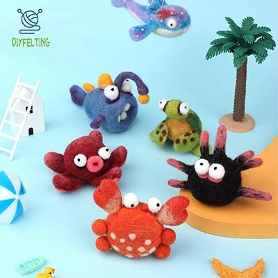 An assortment of 12+ different finished sea creature felted keychains.